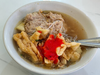 Bakso, Meatballs are served in white bowls, equipped with various toppings, they look delicious and delicious, at roadside stalls.