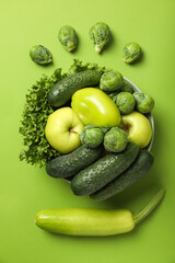 Set of protein vegetables and on green background, top view