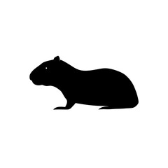 Obraz premium Black Silhouette Of a Side View Capybara Resting on White vector illustration