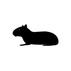 Obraz premium Black Silhouette Of a Side View Capybara Resting Lazily vector illustration
