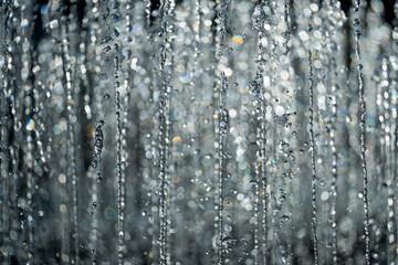 Water drop background. Clear droplet on surface. Dripping water effect. Splashing waters drops....