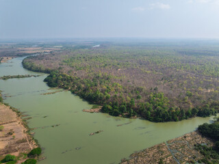 Lush greenery and winding river in Buon Don district, Dak Lak province, Vietnam during daytime