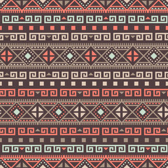 A vibrant tribal pattern showcasing red, green, and blue colors in a striking geometric layout