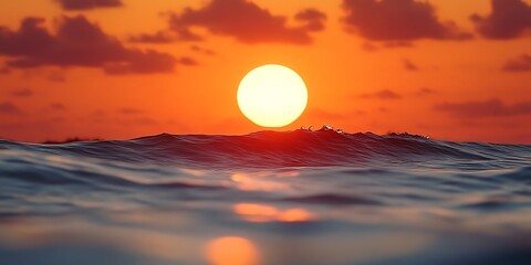 Fiery Sunset Over Ocean Waves