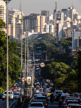 Sao Paulo, Brazil, December 11, 2018. Vehicle traffic jam on Ruben Berta Avenue, part of the North - South corridor, in the south side of Sao Paulo city, with downtown buildings background
