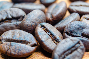 Side view of micro photography of roasted coffee beans with customizable space for text