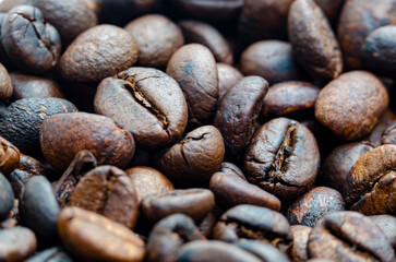 Close up of roasted coffee beans with customizable space for text.