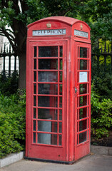 Traditional Red Telephone Booth in London Park