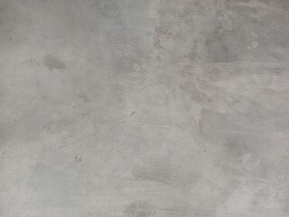 Distressed Gray Concrete Wall with Subtle Patches and Stains
