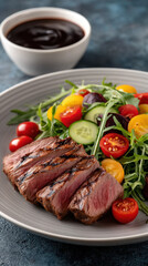 Grilled steak fresh salad cherry tomato cucumber arugula gourmet meal healthy delicious
