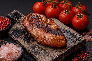 Chicken breast, grilled fillet, meat meal on a plate. Grilled poultry for dinner
