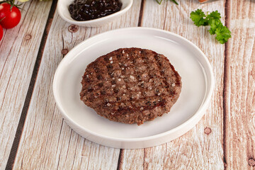 Grilled juicy beef cutlet for burger