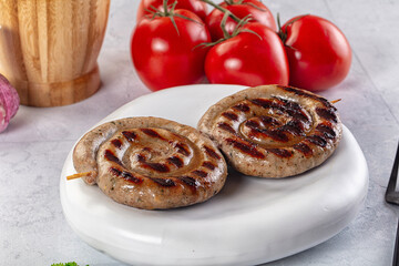 Grilled beef round circle sausages