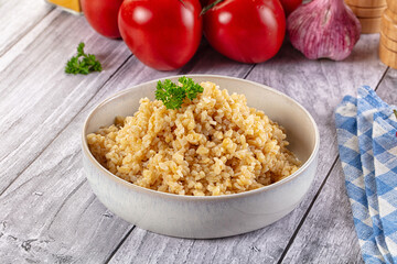 Vegan cuisine - boiled bulgur garnish