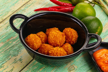 Fried crispy yellow cheese balls