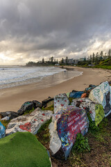 Port Macquarie, New South Wales, Australia - 05 12 2025: Town beach with a lone surfer, approximately one week prior to the May 2025 flood event.