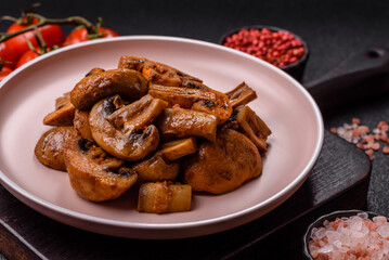 Food, baked mushrooms champignon slices with sauce and spices
