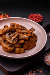 Food, baked mushrooms champignon slices with sauce and spices