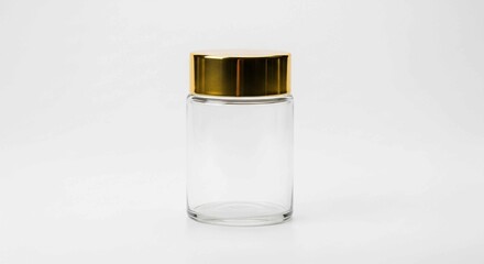 This clear glass jar features a striking gold lid, suitable for premium skincare products or gourmet food items.
