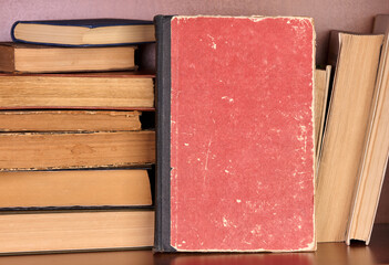 Old book with copy space on a bookshelf
