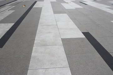 Obraz premium Granite tiles walkway perspective view pattern background 