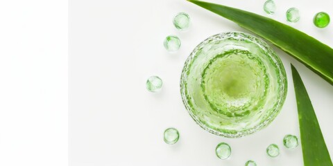 Aloe Vera Plant CloseUp with Green Liquid in Glass Bowl on White Background, Fresh and Vibrant Concept