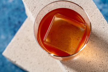 Elegant luxury cocktail in front of dark background