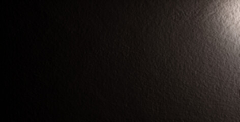 Blurred dark background for studio rendering and soft light. Rough wall and luxury black backdrop...