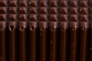 Close up chocolate bar texture background. Macro shot chocolate bars.