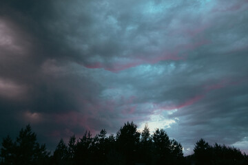 Beautiful colorful stormy sky at sunset. Sunset with mood stormy sky