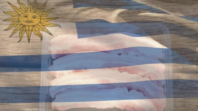 With sunlight shifting faint Uruguay flag overlay waving over bacon container showing Uruguay pride