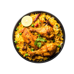 A bowl of chicken biryani garnished with herbs, lemon, whole spices, and green peas