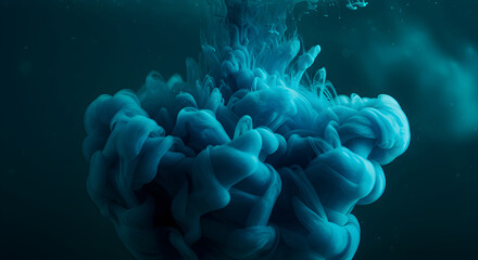 Captivating Cloud Of Teal Ink Spreading Subtly Under Water For Mystic Concept