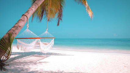 Romantic beach swing hammock over white sand