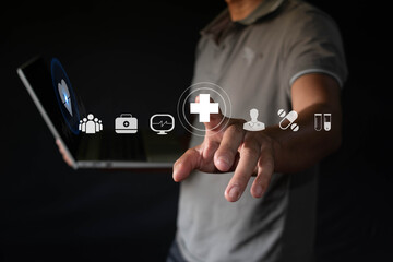 Man holding virtual medical icon for treatment and healthcare concept