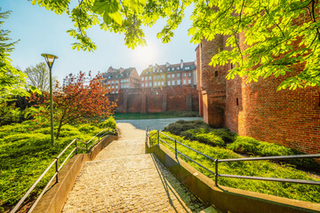 Warsaw old city center with Warsaw Barbican near Vistula river in the morning