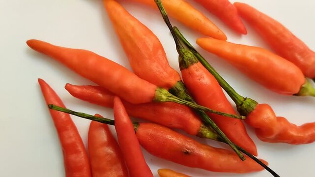 cayenne pepper (cabe rawit) on a white background. This cayenne pepper or cabe rawit is famous for its very high level of spiciness.