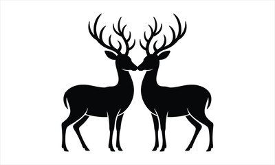 Fototapeta premium Two elegant deer silhouettes facing each other