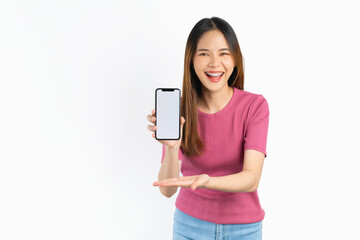 Fototapeta premium Smiling asian woman holding smartphone with blank screen for advertise on white background.
