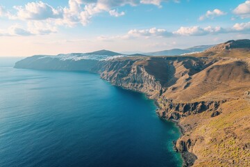 Stunning aerial view of Santorini island showcasing dramatic cliffs and crystal blue waters during a holiday vacation, Santorini island aerial view Holiday vacation in Greece landscape background