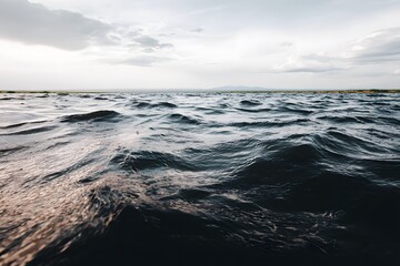 Waves rolling across the ocean surface coastal area nature photography tranquil environment aerial view serenity concept