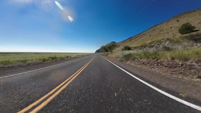 Tule Lake Mormon Crickets Swarm 04 Front View Driving Plates of Volcanic Legacy Scenic Byway Southbound California USA Ultra Wide