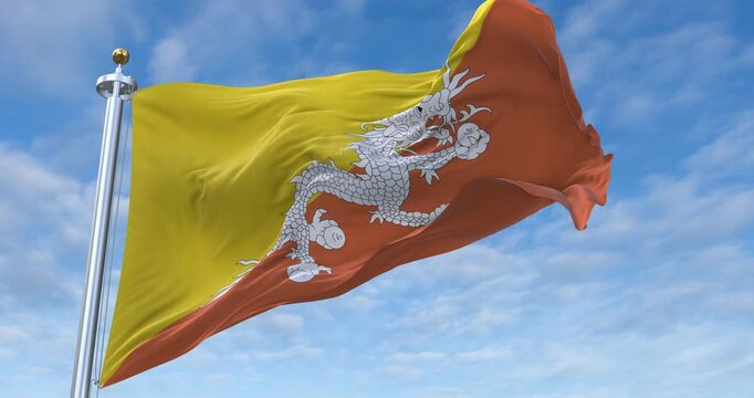 Bhutan flag with flagpole waving in wind, rolling clouds background looping, 4K video (Perfect Loop)
