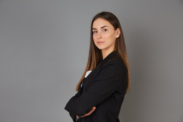 young businesswoman posing in studio background