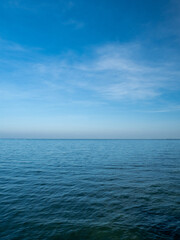 Fototapeta premium Photography open sea island view landscape beautiful summer vertical horizon cloud clean and blue sky background air fresh calm nature ocean wave water no body travel holiday on sun day time