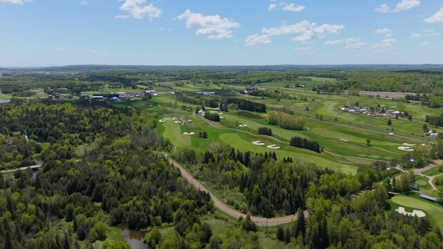 Aerial Flyover Of TPC Toronto At Osprey Valley Golf Course And Surrounding Forest In Ontario, Canada.