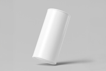 Blank white cylindrical can mockup on gray background. Ideal for product design, branding, and packaging presentations for beverages or snacks.