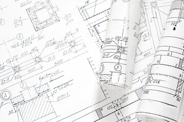 architect design working drawing sketch plans blueprints and making architectural construction model in architect studio,flat lay..