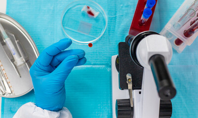 examine blood in the laboratory. Selective focus.