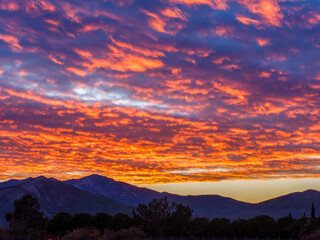 Sunset paints the sky over Marathonas in Attica